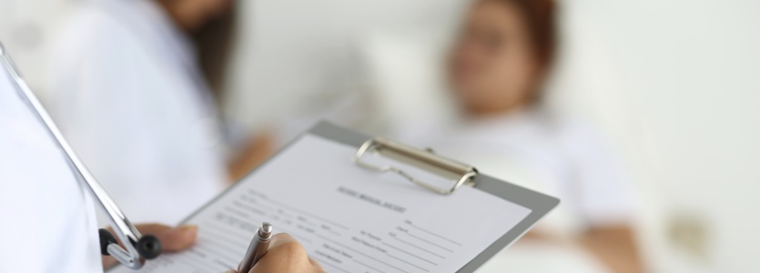 Physician ready to examine and help patient