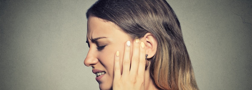 side profile sick young woman having ear pain ear